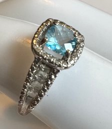 PRETTY BLUE TOPAZ AND WHITE SAPPHIRE STERLING SILVER RING