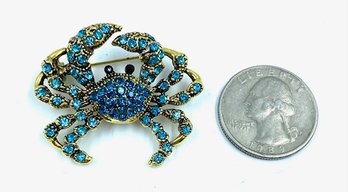 Goldtone & Capri Blue Rhinestone Crab Brooch