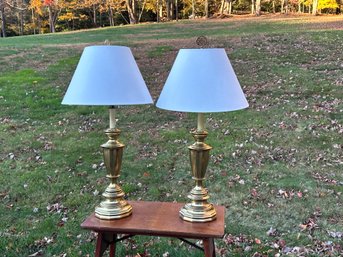 A Pair Of Brass Lamps