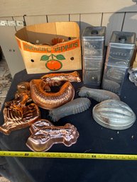 A CANNISTER SET AND MISC COPPER MOLDS