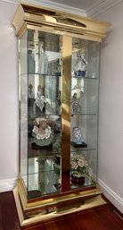 A Glamorous Brass And Glass Lighted Display Case