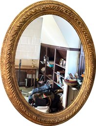 A Vintage Oval Gilt Framed Mirror