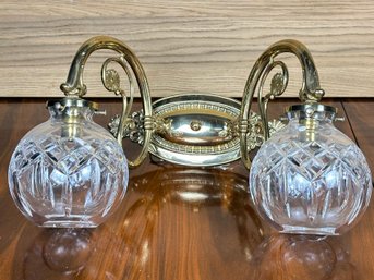 A Brass And Cut Glass Wall Sconce