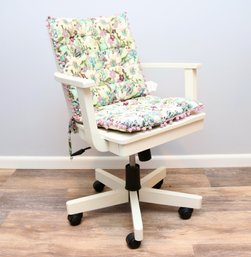 White Armed  Banker's Office Chair On Caster Wheels With Floral Cushion.