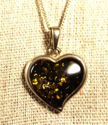 Fine Sterling Silver Chain Necklace Having Heart Shaped Amber Pendant