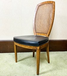 A Vintage Modern Cane And Vinyl Side Chair