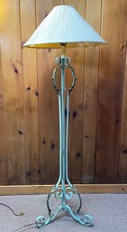 A Painted Wrought Iron Floor Lamp