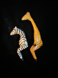 2 Piece Wooden Giraffe And Zebra Sitting Figurines