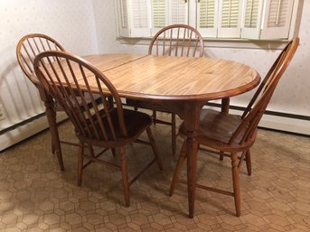 Well Made Solid Wood Table With 4 Chairs And A Leaf