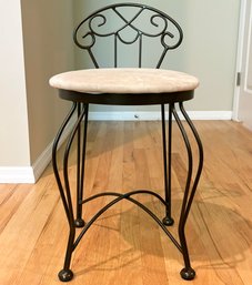 A Wrought Iron Vanity Seat