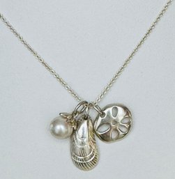 SIGNED STELLA & DOT STERLING SILVER SHELL, PEARL AND SAND DOLLAR NECKLACE