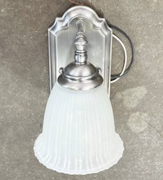 A Chrome And Frosted Glass Wall Sconce