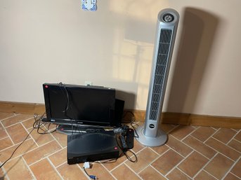 FLAT SCREEN TV, DVD PLAYER, AND A FAN