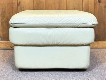 An Italian Leather Rolling Ottoman