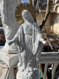 Virgin Mary Statue On A Column Base