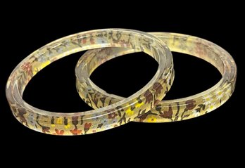 Pair 1970s Lucite Plastic Floral Decorated Bangle Bracelets