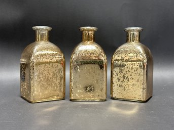 Three Decorative Bottles In Mercury Glass