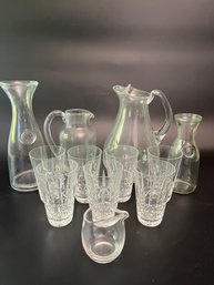 Assorted Glass Pitchers And Crystal High Ball Glasses