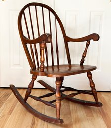 A Vintage Carved Oak Rocking Chair