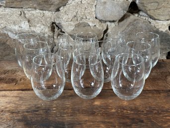 A Set Of Twelve Stemless Wine Glasses