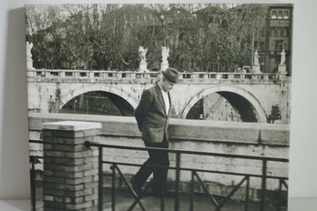 Classic Image Of A Man Walking On A Parisian Bridge
