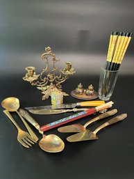 An Assortment Of Kitchen Utensils - Chopsticks, Candleholders, Knives, And More