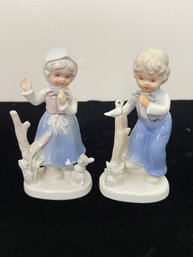 Pair Of Porcelain Ceramic Figurines