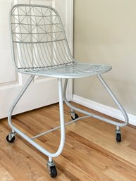 A Modern Metal Office Chair, On Casters
