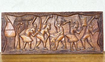 A Large African Carved Relief Wall Panel