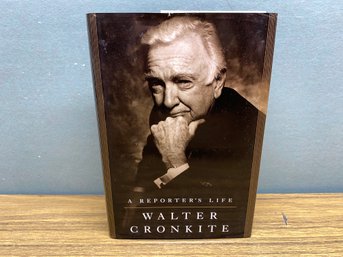 Walter Cronkite. A Reporter's Life. 384 Page ILL HC Book In DJ. Signed By Author. Colophone Last Page. 1996.