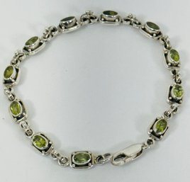 PRETTY STERLING SILVER AND PERIDOT LINK BRACELET