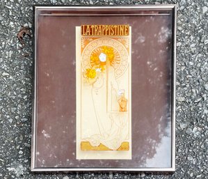 A Vintage Reverse Glass Printed Art Nouveau Advertisement