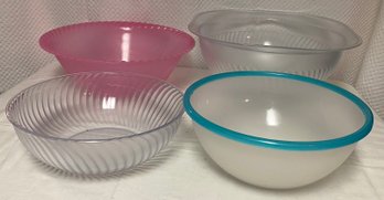 Four Plastic Serving Bowls