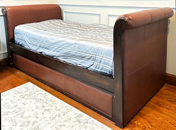 An Elegant Chestnut Leather And Cherry Wood Daybed With Trundle, Likely Arhaus