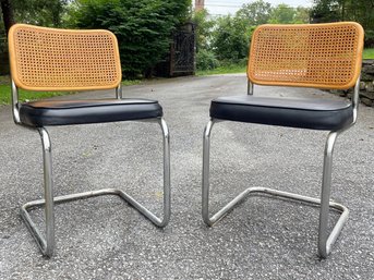 A Pair Of Vintage Leather And Cane Cesca Chairs