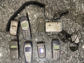 Collection Of Older Electronics Including Nokia, LG & Olympus