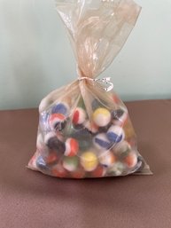 A Bag With Vintage Marbles.