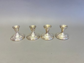 Group Of 4 Sterling Candlesticks