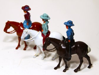 Lot Three Two-part Lead Cowboy On Horseback Figures