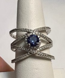 GORGEOUS SIGNED RHODIUM OVER STERLING SILVER SIMULATED TANZANITE AND WHITE STONE RING