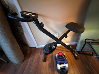 Marcy Folding Exercise Bike And Assorted Hand Weights