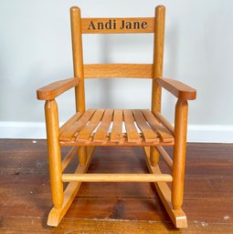 A Child's Oak Rocking Chair