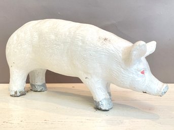 A Cast Stone Pig Statue