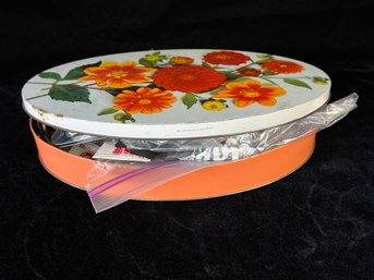 Floral Tin Full Of Carpet Tacs, Hooks And Accessories