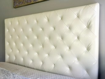 A Tufted Leather Queen Headboard