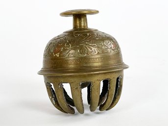 An Antique Etched Brass Bell