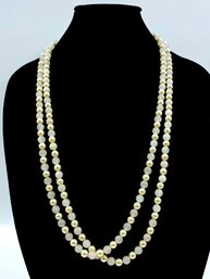 Pair Of Faux Pearl And Quartz Pearl Single Strand Necklaces.