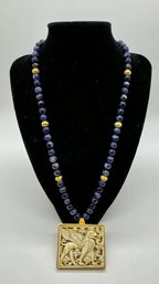 Bead Necklace With Ornate Carved Pendant