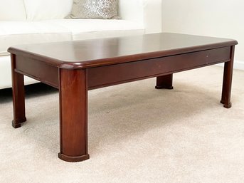 A Contemporary Mahogany Coffee Table With Versatile Raised Worksurface/Top