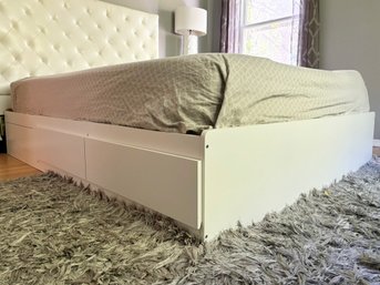 A Queen Platform Bed With Storage Drawers
